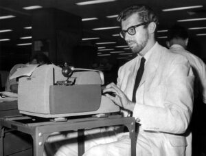 Henry Raymont, head of United Press International staff in Cuba, typing his story at UPI world headquarters in New York, April 26, 1961.