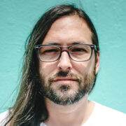 Headshot of Graham Lee Brewer