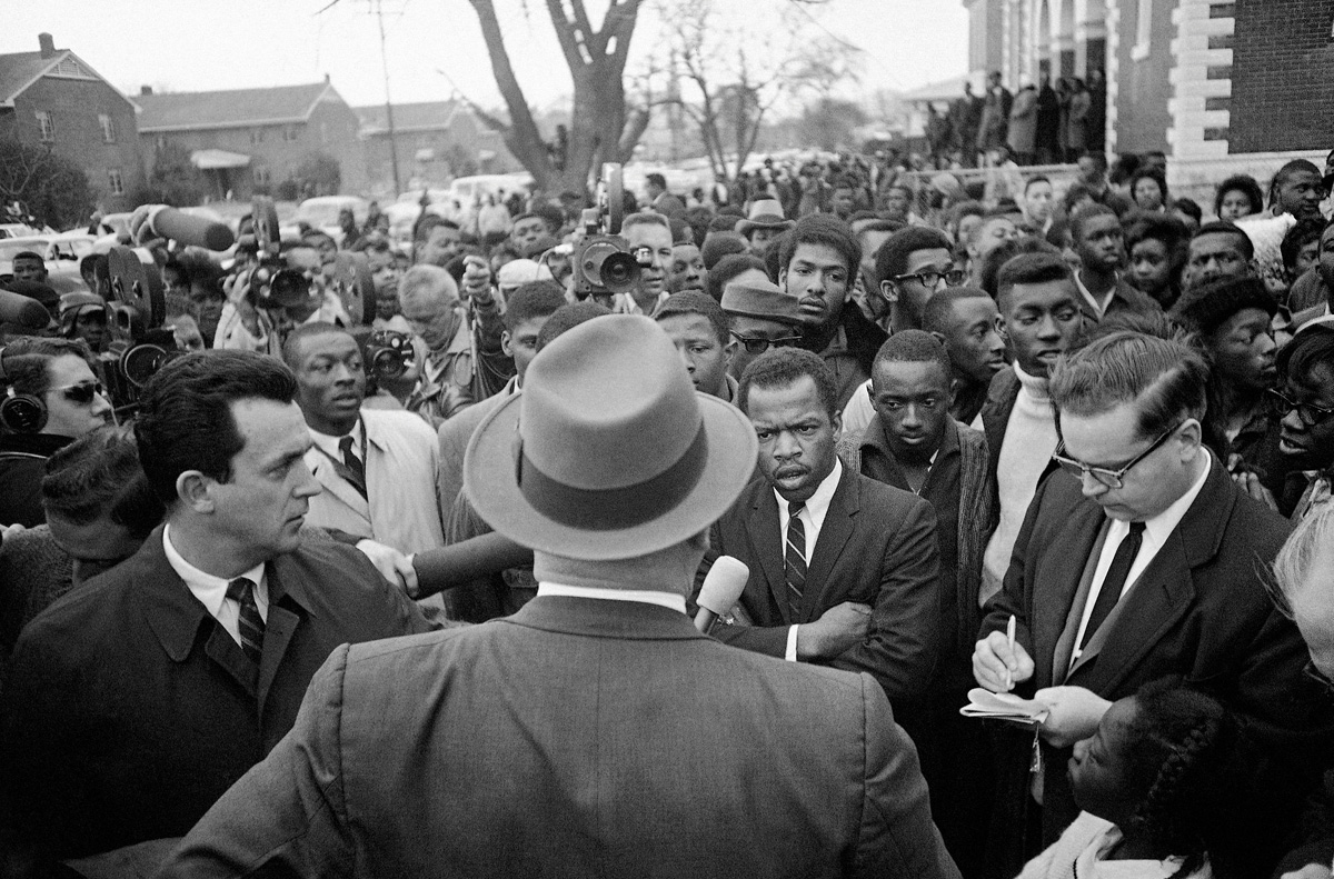 Wilson Baker, the public safety commissioner in Selma, Alabama, urges a crowd of civil rights demonstrators to turn back in February 1963. The marchers dispersed, but coverage of the confrontation appeared in the next day’s New York Times