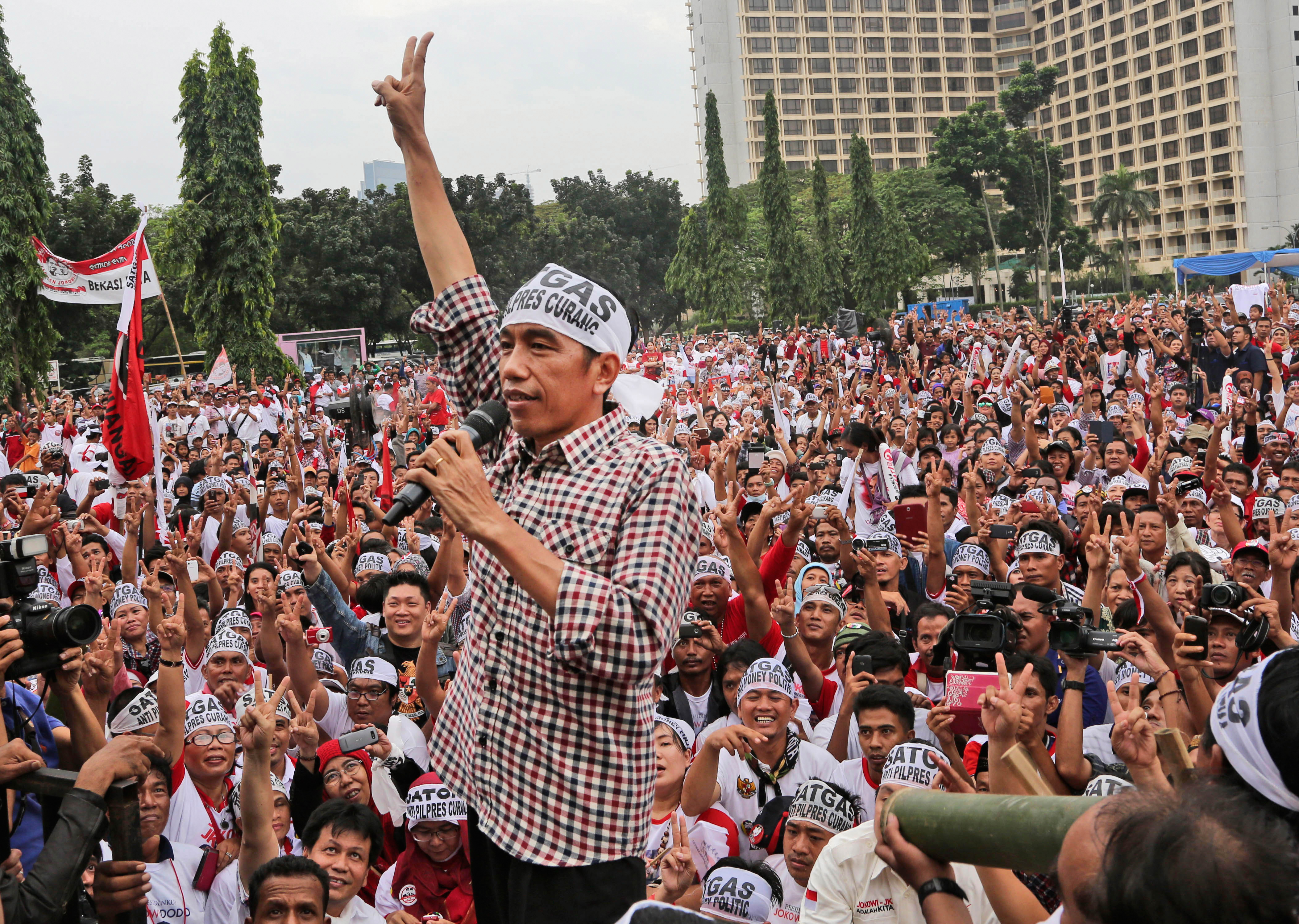 Joko Widodo, shortly before he won the Indonesian presidential election in July. Earlier in the campaign, one of his rivals was media tycoon Aburizal Bakrie