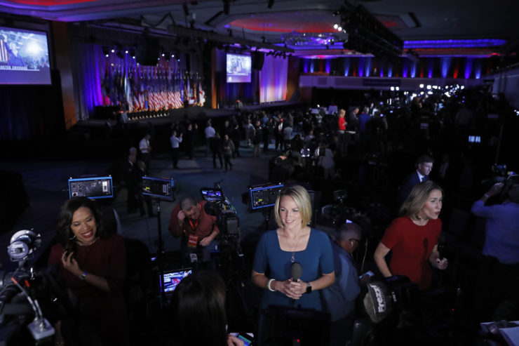 Reporters speak on-camera as they wait for supporters to arrive at Republican presidential candidate Donald Trump's election night rally in New York