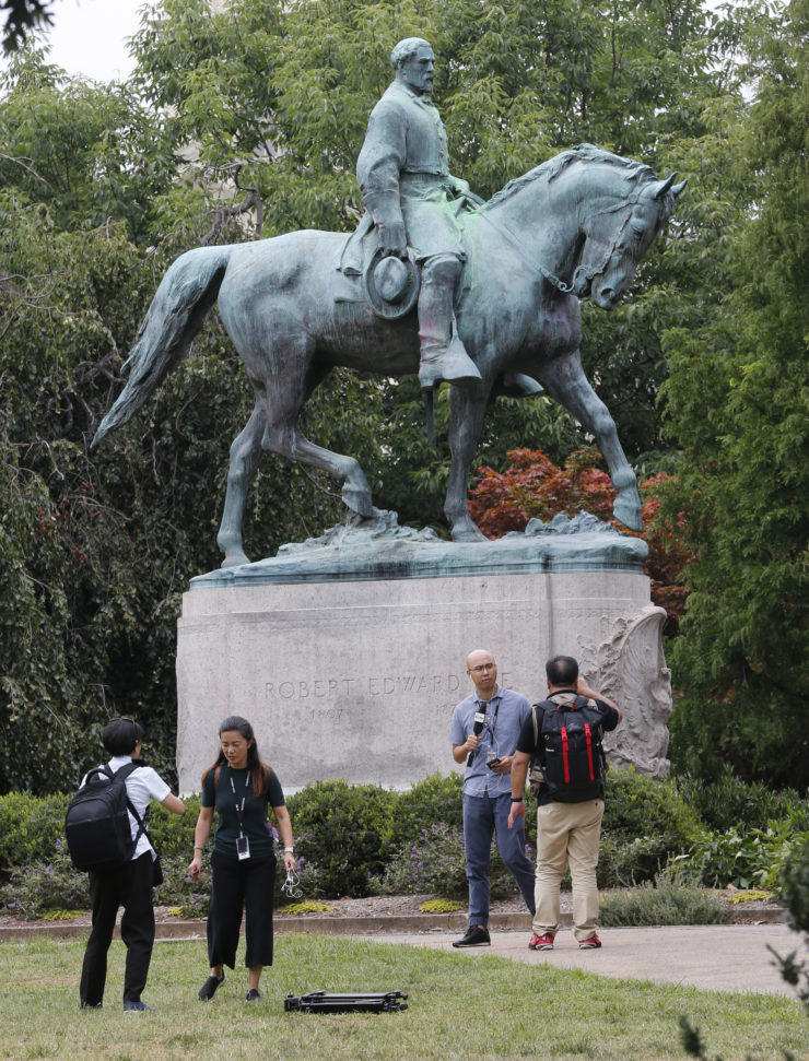 The statue of Confederate General Robert E. Lee in  Charlottesville, Va., is at the center of racial tensions in town. The statue's removal is in litigation.