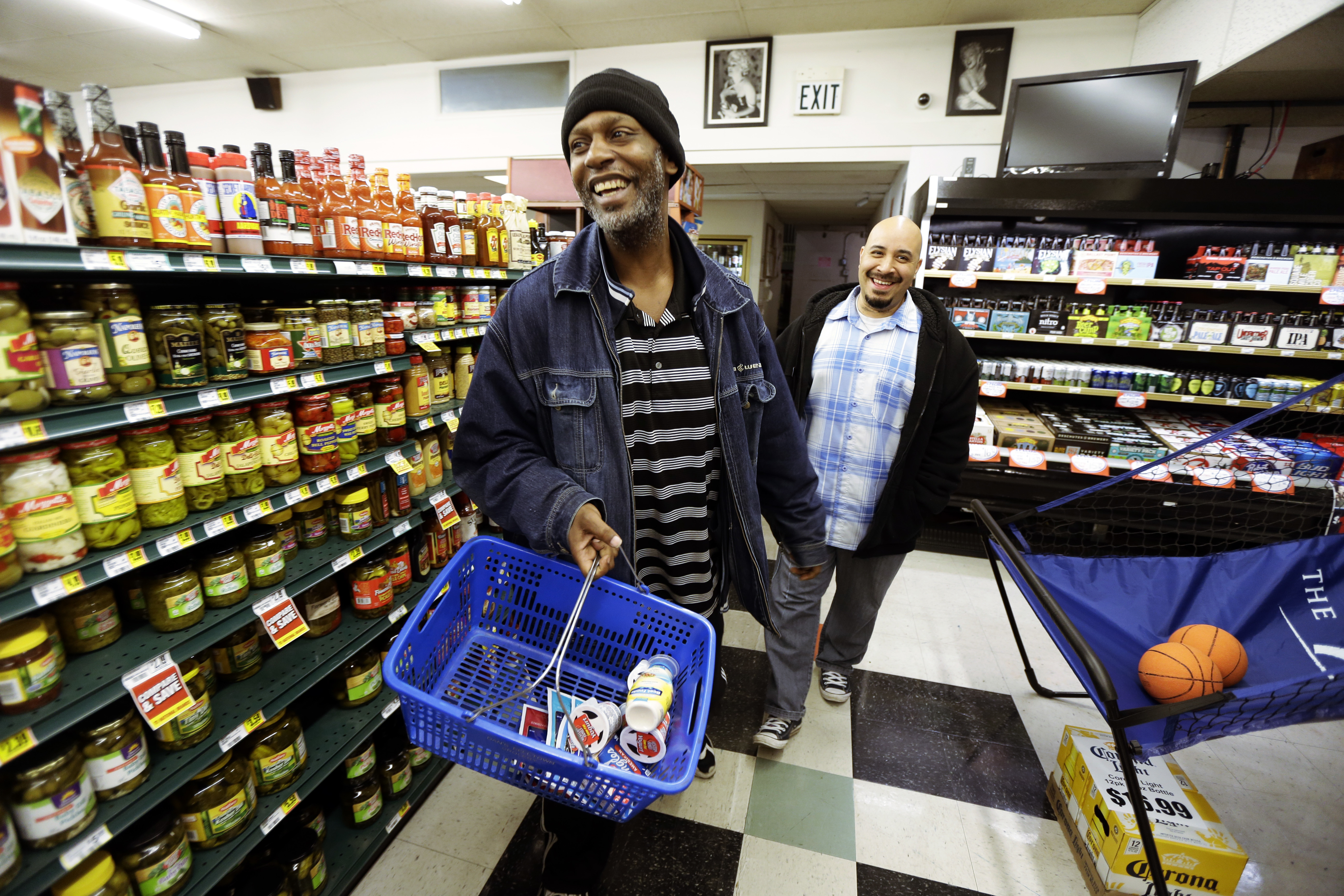 Frontline’s “Chasing Heroin” spotlights Seattle’s Law Enforcement Assisted Diversion (LEAD) program, which allows police officers in the city to redirect people stopped for low-level drug crimes to community-based services instead of jail. Here, Jerald Brooks, left, one of the programs original participants, goes shopping with his caseworker  