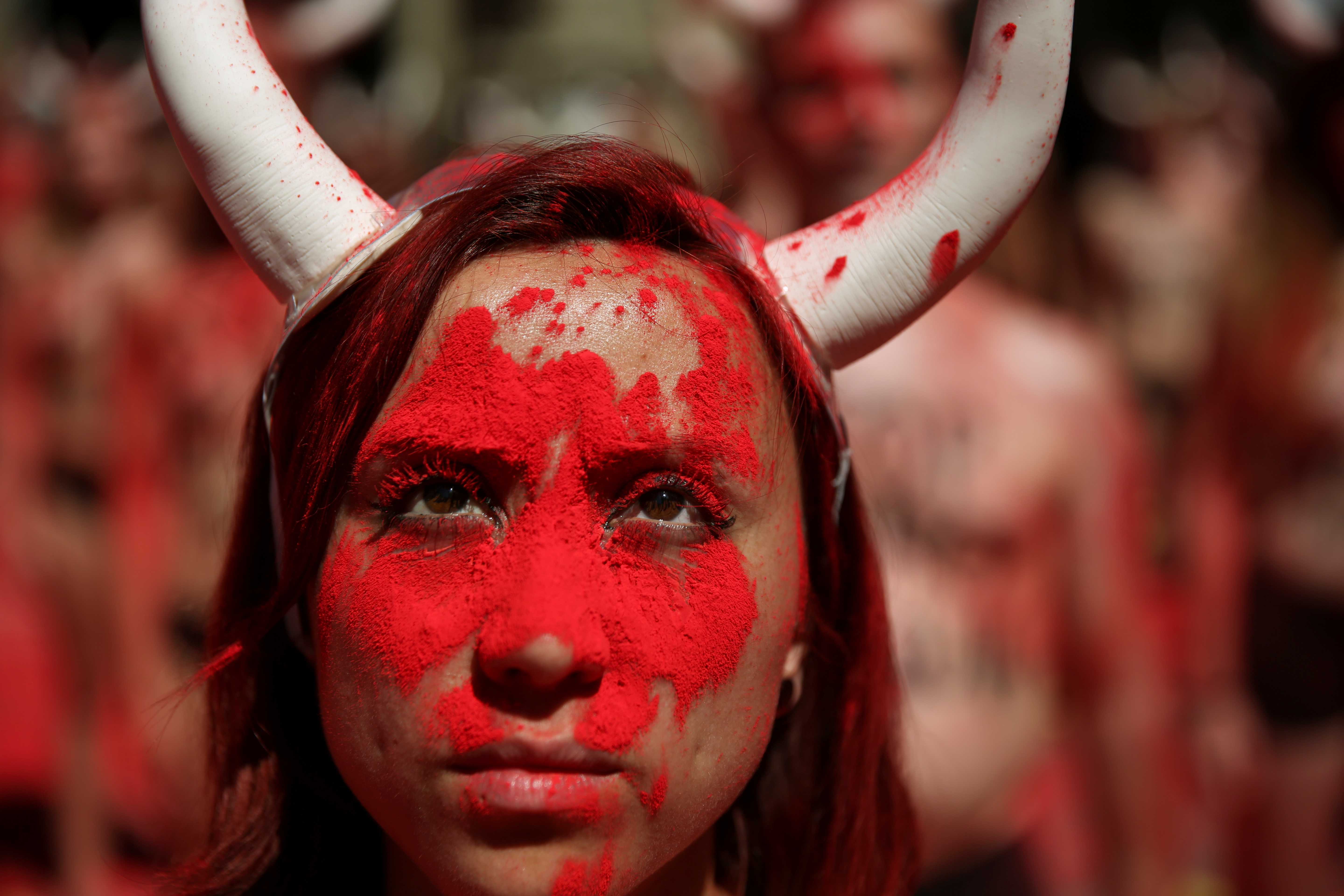 A protestor during a July 2017 demonstration against bullfighting before the start of Spain’s famous running of the bulls San Fermin festival. Bullfighting is among the many popular discussions, ranging from racial profiling to football, featured on Kialo, one of several news startups working to foster civic discourse