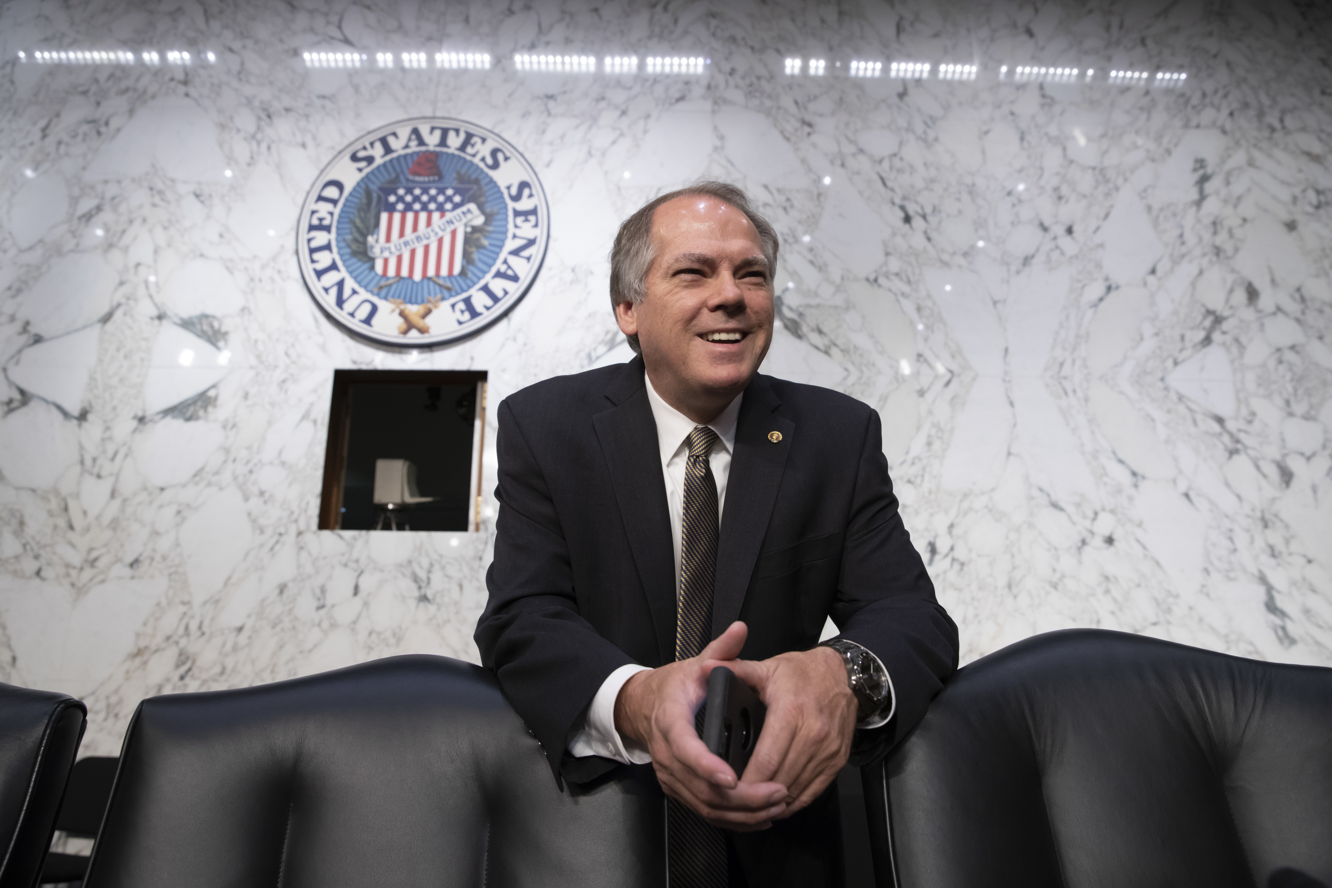 James Wolfe, then-director of security with the Senate Intelligence Committee, waits for the start of a hearing with the nation's national security chiefs about Russia's election meddling, on Capitol Hill in Washington in June 2017. Federal prosecutors are accusing Wolfe with lying to the FBI about contact he had with reporters who covered the committee