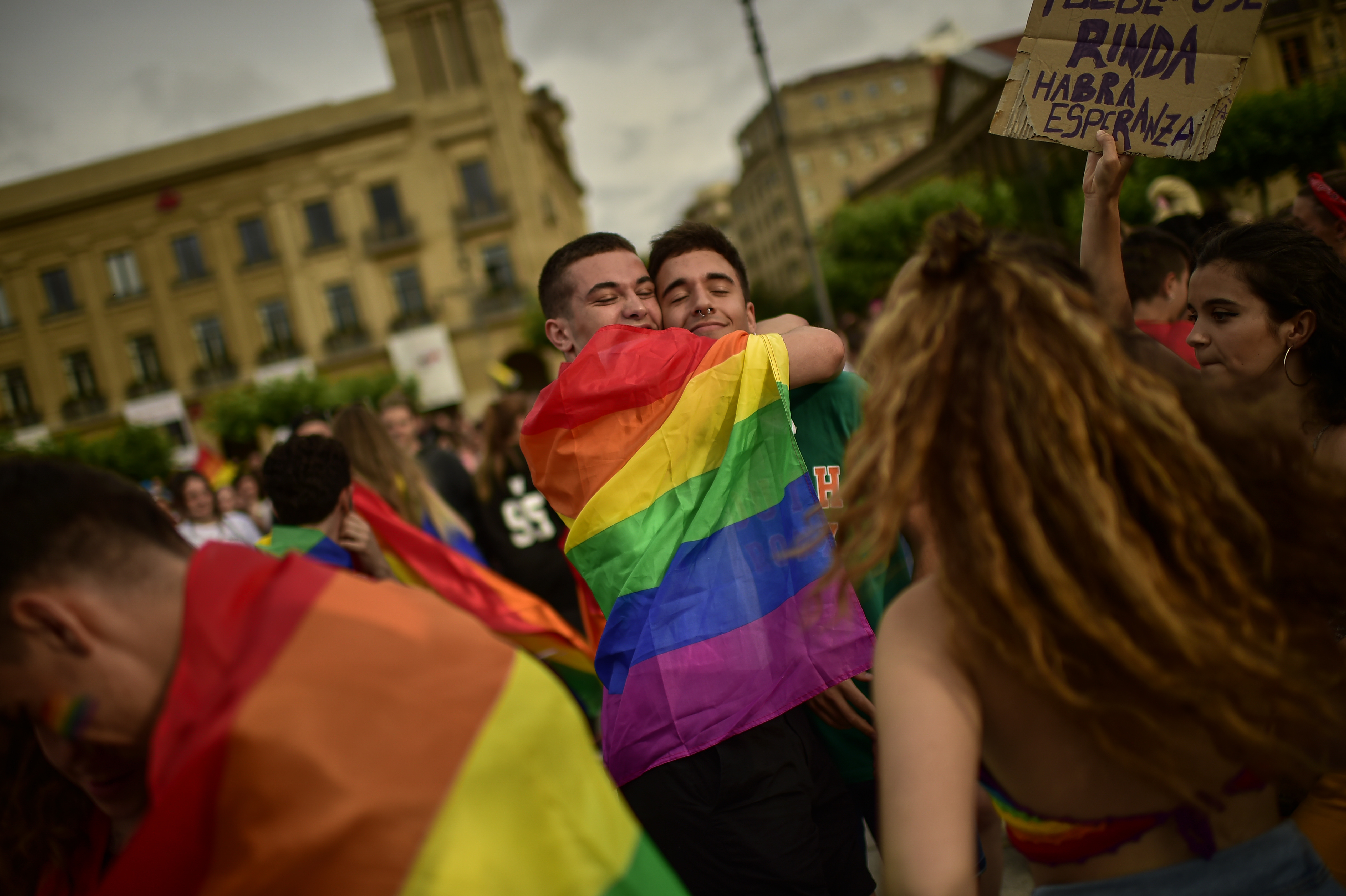 Demonstrators wrapped in a rainbow flag take part in a protest to support transsexual people fighting for their rights during the LGBT Pride Day, in Pamplona, Spain in June 2018. Eldiario.es has extensively covered LGBT rights in the country