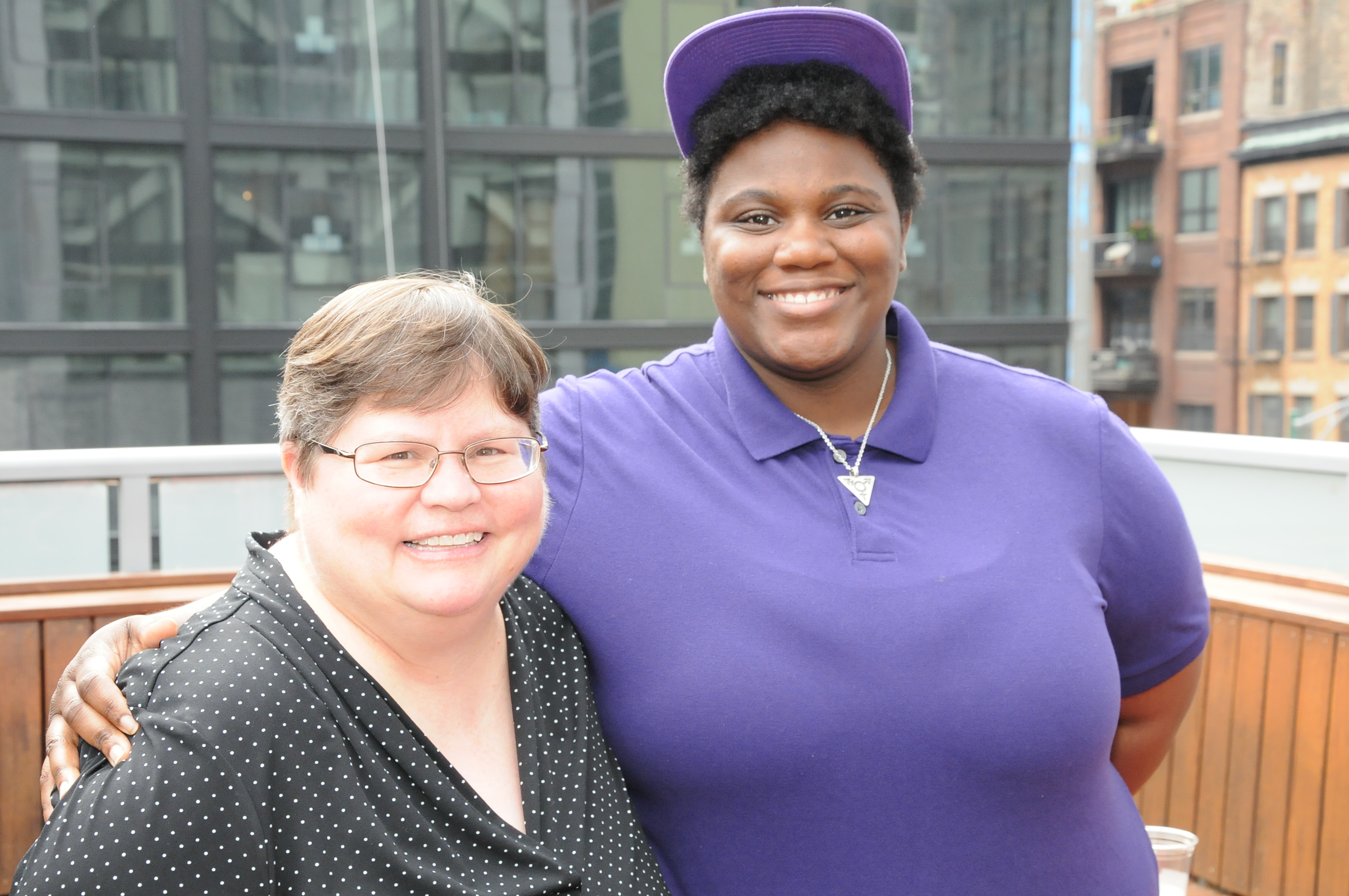 Windy City Times editor Tracy Baim (left) with Breezy Connor in 2018. Connor read her poem, about her experiences battling the elements as a homeless teen in Chicago during winter, at a summit on homeless LGBTQ youth organized by the Windy City Times in 2014