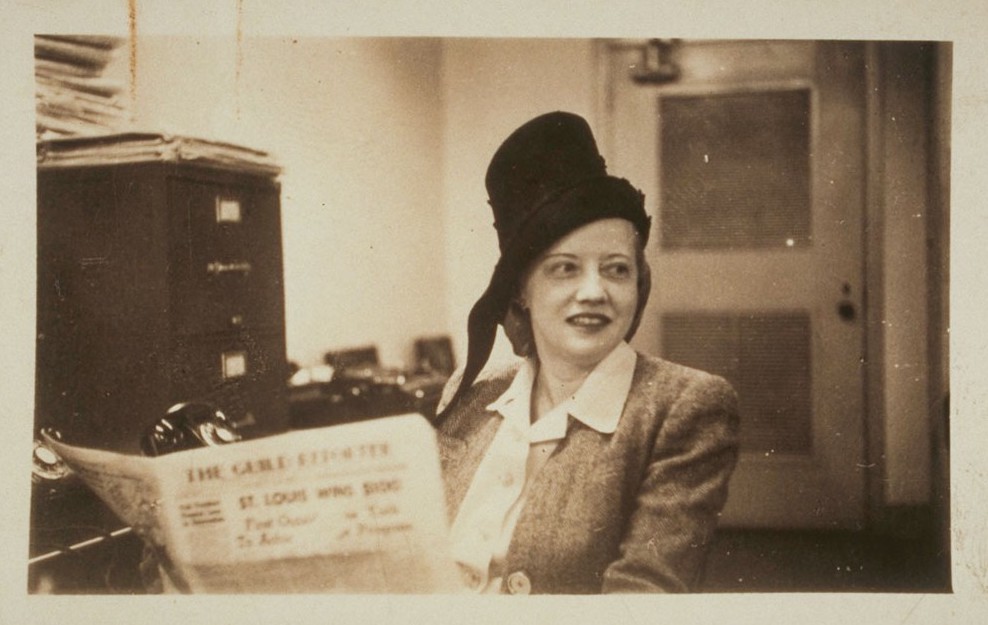 Ruth Cowan, circa 1947, holds a copy of The Guild Reporter