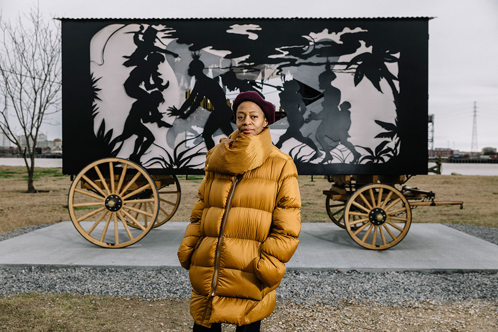 Kara Walker, who was among the artists mentioned by survey respondents, pictured at Algiers Point in New Orleans in 2018 with her performative sculpture "Katastwóf Karavan." It features her signature silhouettes depicting the Old South and a steam-powered calliope that plays songs of black protest and celebration