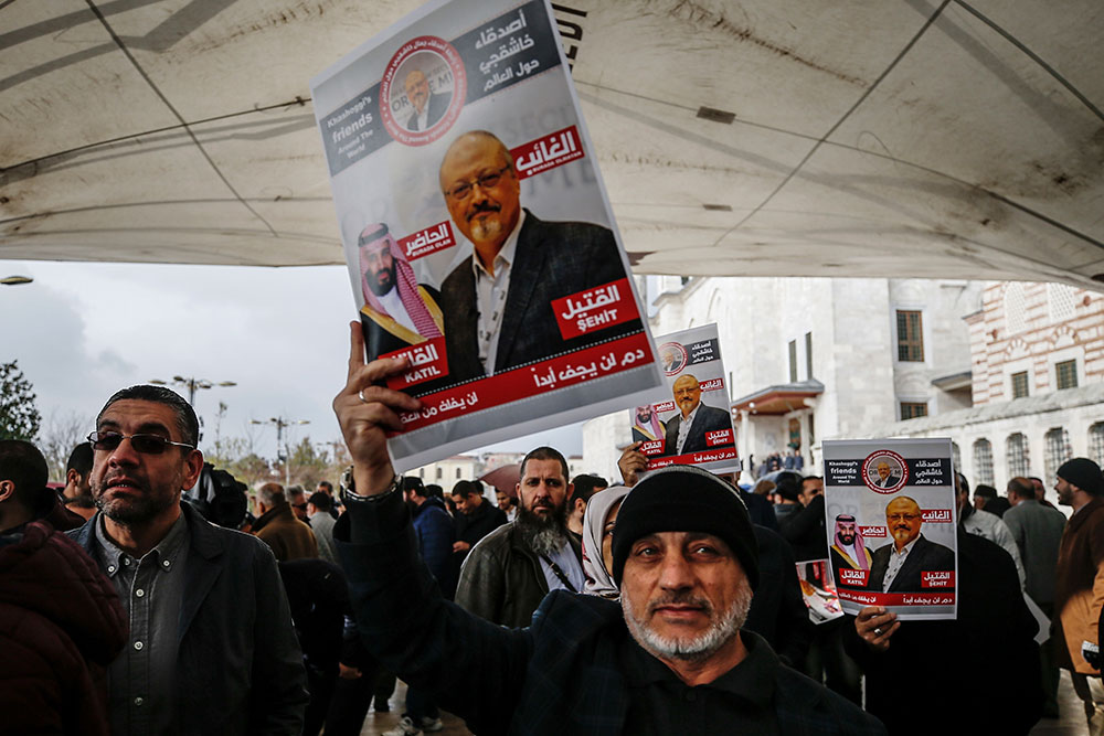Members of the Arab-Turkish Media Association and supporters demand justice for slain Saudi journalist Jamal Khashoggi during funeral prayers in Istanbul in November 2018