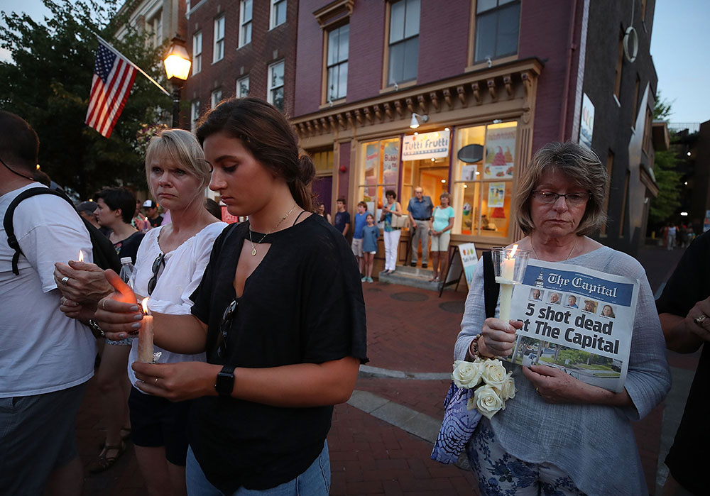 People line the streets in Annapolis, Maryland in June 2018 to honor the five staffers killed at The Capital Gazette