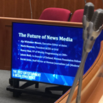 Screen showing speakers for Harvard Business School event "The Future of News Media"