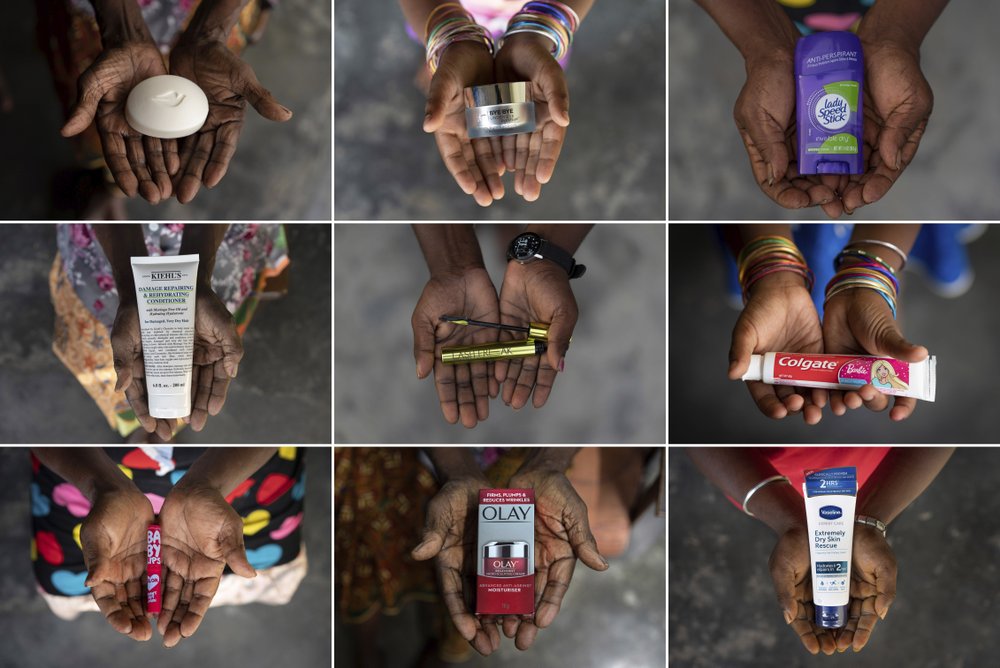 Hands of five generations of women from a family that has worked on the same palm oil plantation since the early 1900s, ranging in age from 6 to 102. They each hold products made by iconic Western companies that source palm oil from Indonesia and Malaysia.
