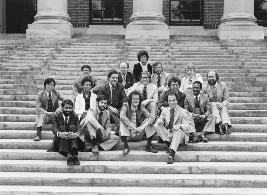 Nieman Fellows sitting on library steps at Harvard