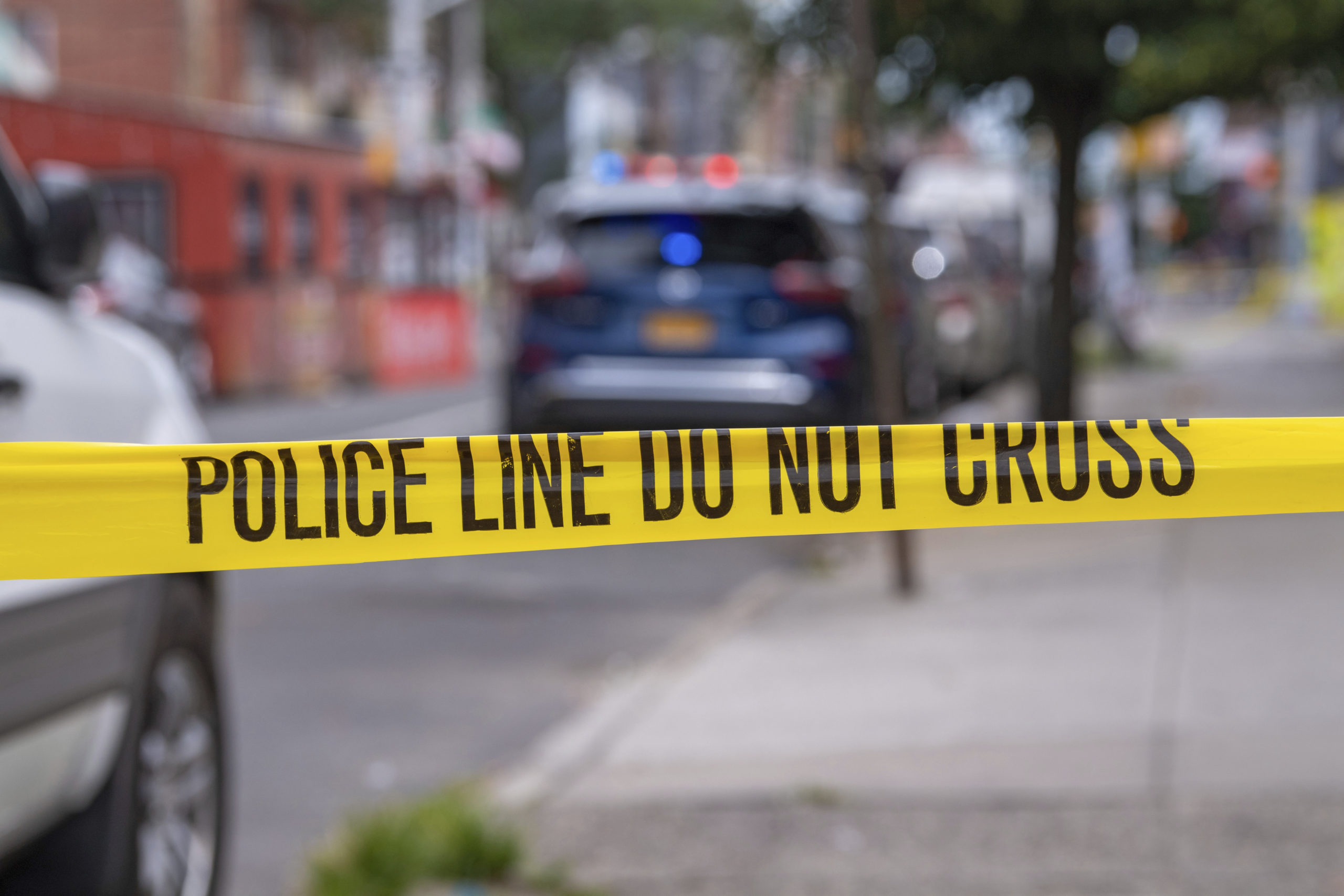 Police tape surrounding a 4-block radius of 99th Street and 37th Avenue in the Corona neighborhood of Queens in New York City. Overall crime declined in 2020, despite the media's emphasis on the increasing murder rate