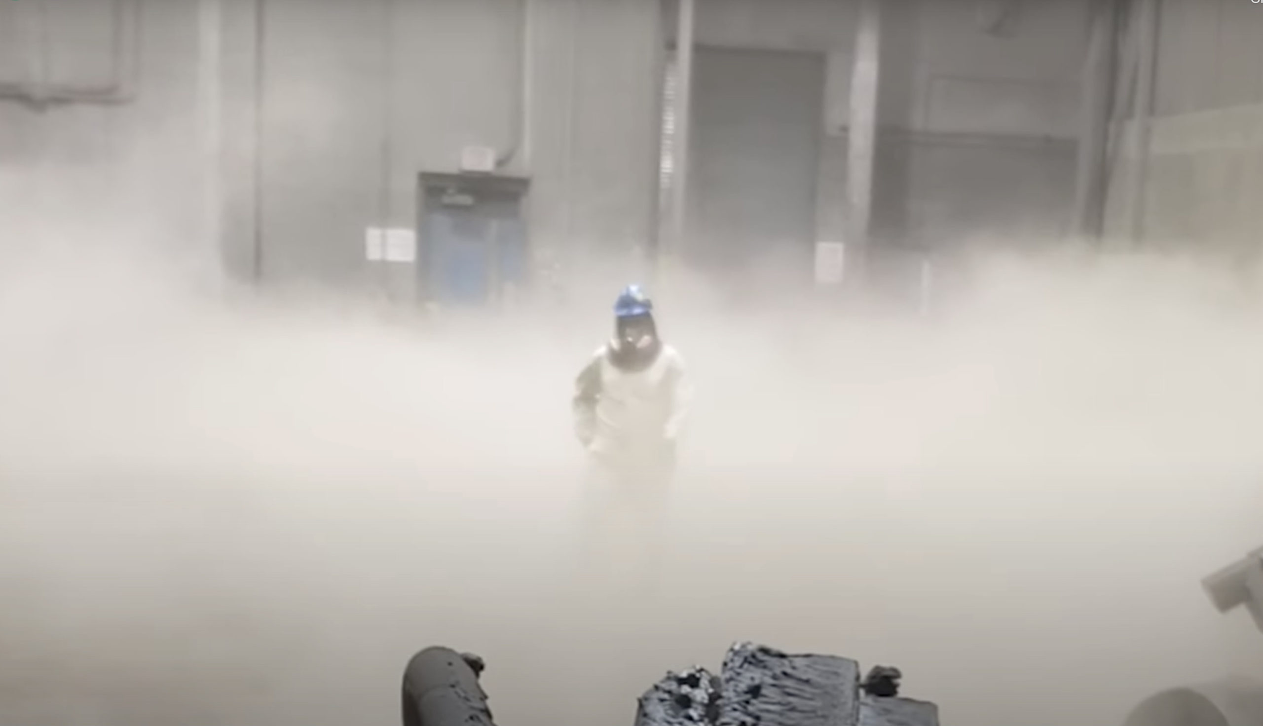 In Tampa, Florida, a Gopher Resource worker on the factory floor is surrounded by a cloud of lead dust