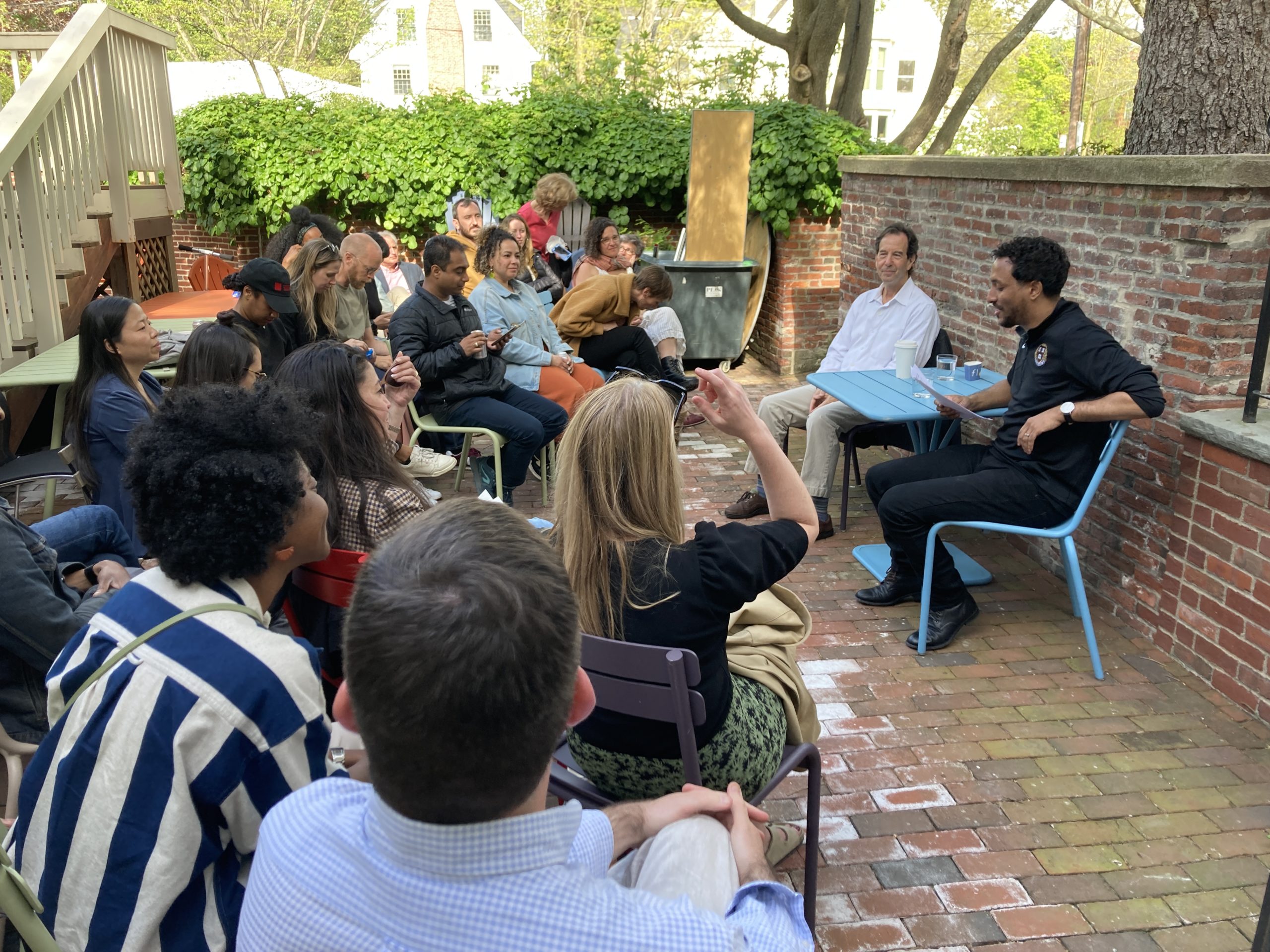 Prof. Ronald Heifetz (sitting near the wall with a light blue shirt), founder of Harvard's Center for Public Leadership, speaks with moderator Jonathan Rabb and other 2022 Nieman Fellows on May 11, 2022.