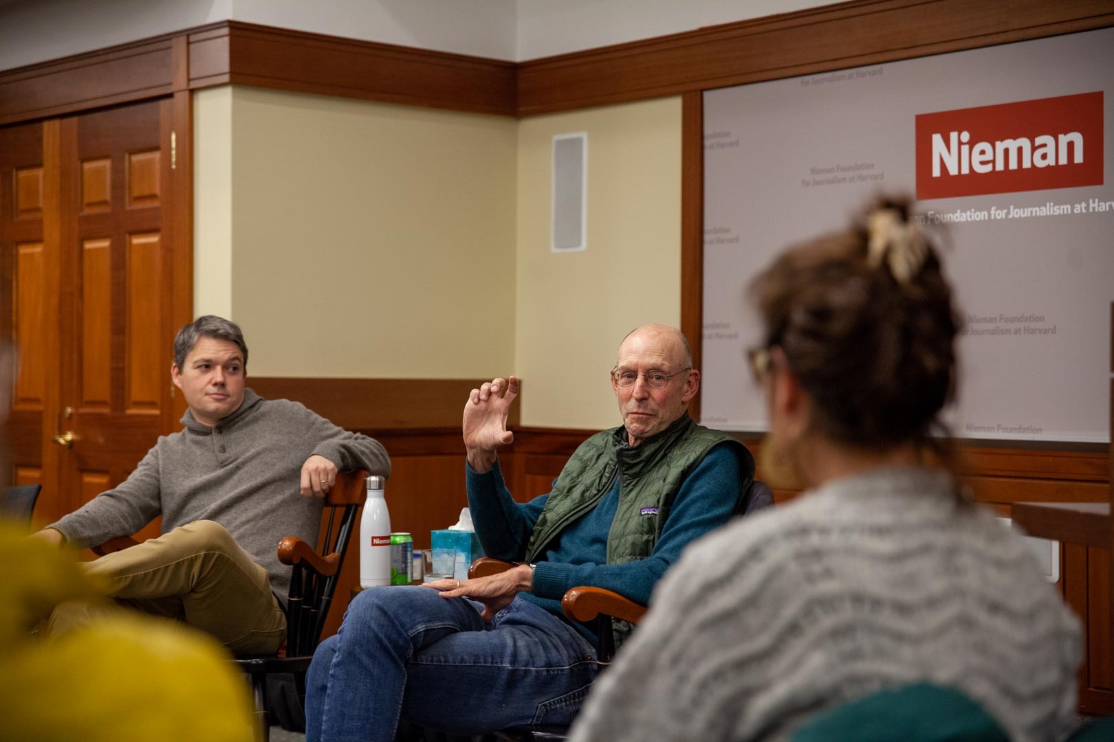 Author Michael Pollan (center) speaks with moderator Alex Smith and the 2023 Nieman Fellows on Nov. 16, 2022.
